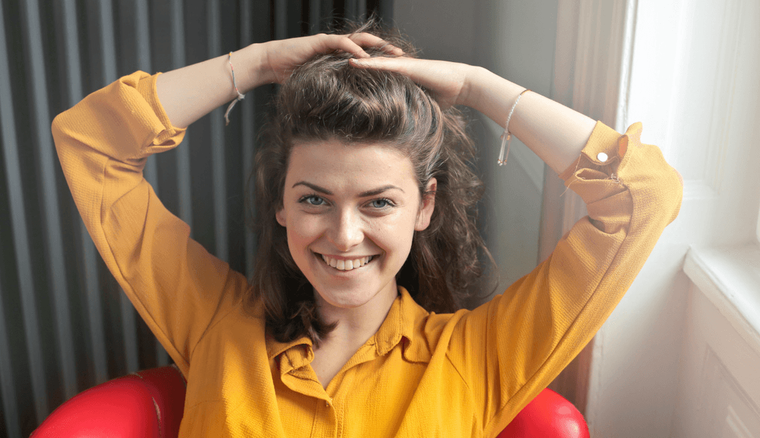 smiling-woman-red-chair